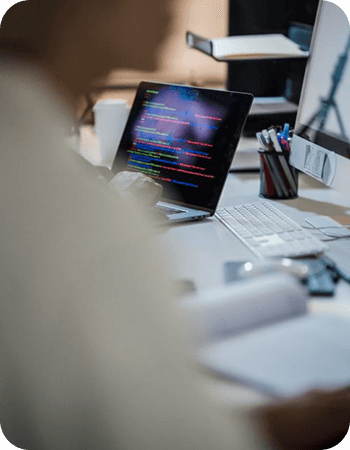 Web development and coding on a laptop in a modern workspace